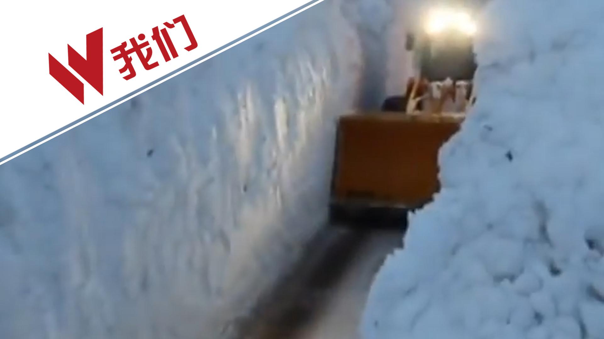 阿尔卑斯山雪崩 推土机在7米高雪墙中开凿隧道